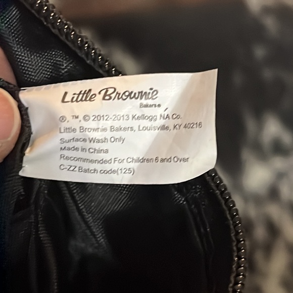 Little Brownie wristlet with bright colored daisies and stripes - Picture 5 of 5